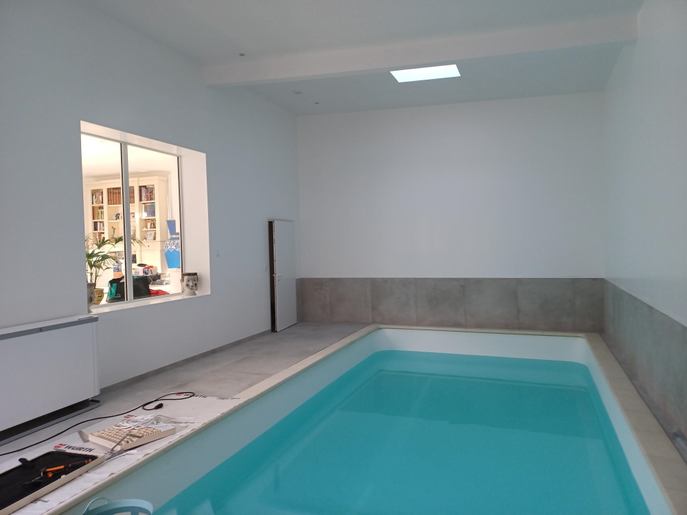 Extension avec piscine intérieur